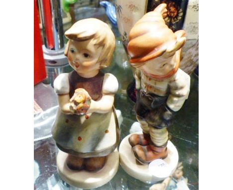 TWO GOEBEL FIGURINES. Two Goebel glazed ceramic figurines, H ~ 14cm and 15cm 