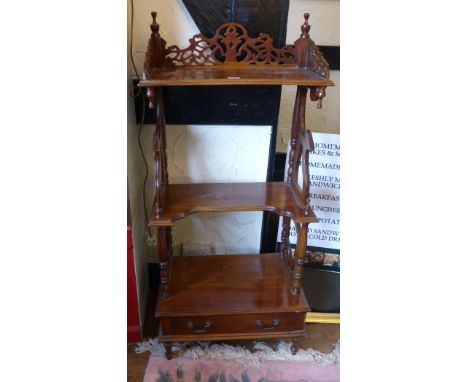 EDWARDIAN DISPLAY UNIT. Edwardian mahogany ornate three shelf display unit with under drawers and pierced back and sides  L ~