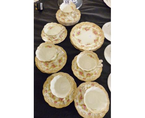 VICTORIAN TEA SERVICE. Unnamed Victorian floral design tea service, twenty one pieces