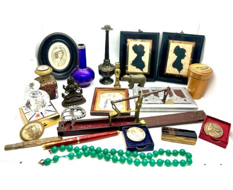 Selection of collectables to include silhouette framed ladies, vase, trinket, pen, buckle etc 