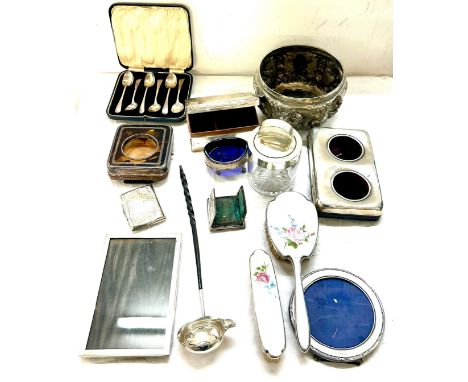 Large selection of assorted silver pieces to include Indian silver detailed bowl, toddy ladle, picture frames, cigarette box,