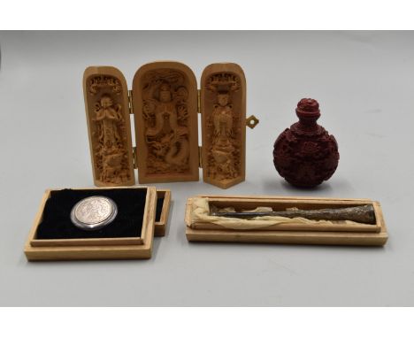 Lot includes: - sterling silver 950 tobacco items in crafted wood storage boxes including a 4-inch cigarette holder and a 192