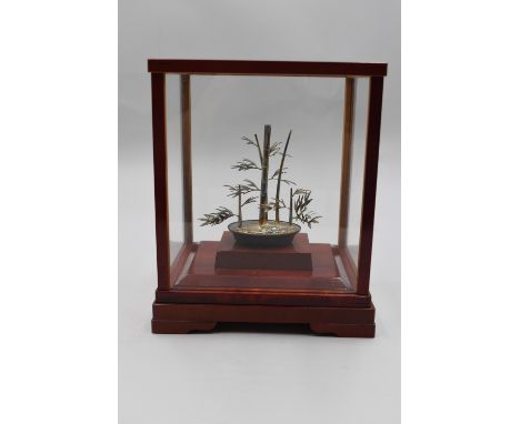 Bamboo Silver craft was created by Mitsunori. The silver is unmarked and tarnished. The case is marked December 15, 1994, by 