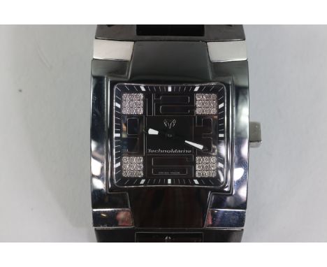 A Geneve Techno Marine Square Ceramique Collection Swiss-made Diamond Watch. The watch was manufactured with ceramic, which i
