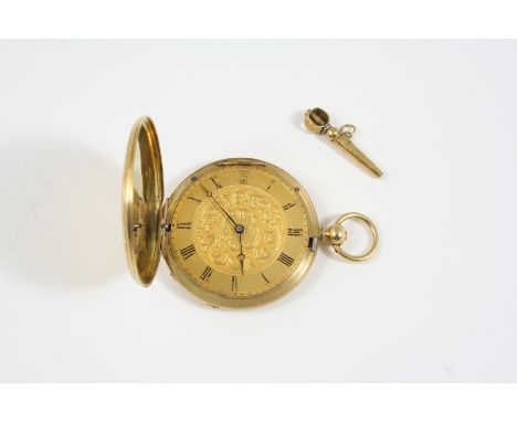 AN 18CT. GOLD FULL HUNTING CASED POCKET WATCH the gold foliate dial with Roman numerals (glass missing), with foliate engrave