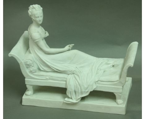 A SEVRES BISQUE PORCELAIN FIGURE, late 19th century, modelled as a maiden reclining on a couch, impressed interlinked Ls mark