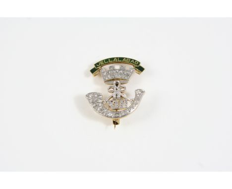 A DIAMOND AND ENAMEL REGIMENTAL BROOCH FOR THE SOMERSET LIGHT INFANTRY set overall with rose-cut diamonds, in gold, 2.5cm. lo