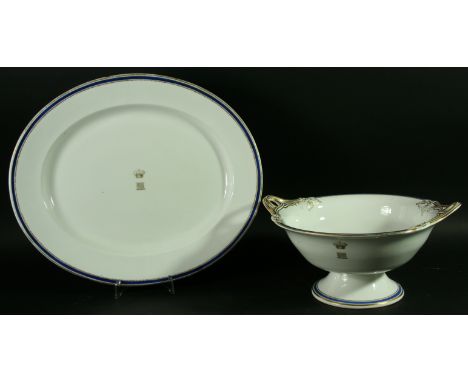 A ROYAL WORCESTER PART DINNER SERVICE, mainly early 20th century, decorated with a central Raglan Crest inside a blue and gil