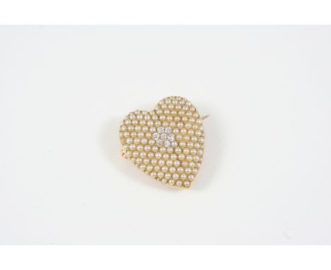 A DIAMOND AND HALF PEARL BROOCH PENDANT of heart-shape, centred with a cluster of small diamonds within a surround of slightl