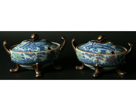 A PAIR OF DAVENPORT STONE CHINA SAUCE TUREENS AND COVERS blue transfer printed, painted with gilded floral chinoiserie scene 