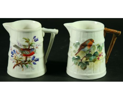 A ROYAL WORCESTER JUG, signed Powell, date cipher for 1941, painted with a Robin; and another, similar, unsigned, date cipher