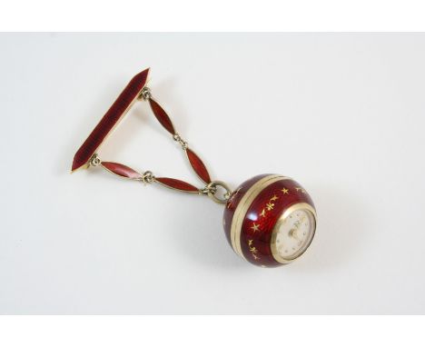 A SWISS RED GUILLOCHE ENAMEL FOB WATCH the circular dial with Arabic quarters and dot numerals, the red enamel with gilt deco