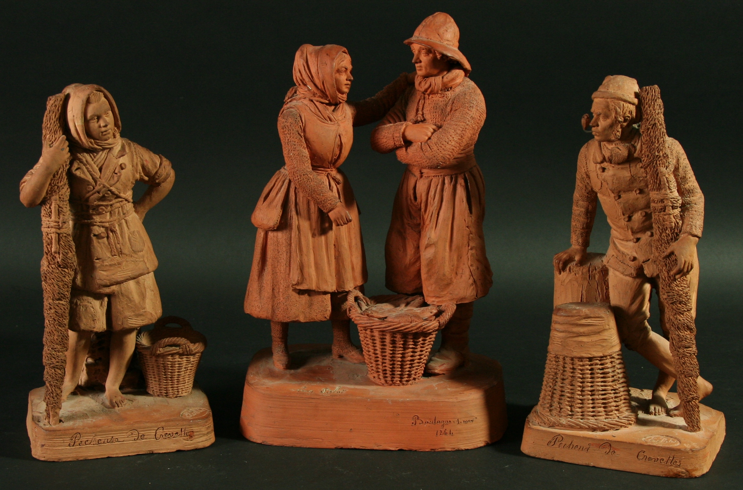 EUGENE BLOT, a terracotta figure group of a fisherman and wife with a ...