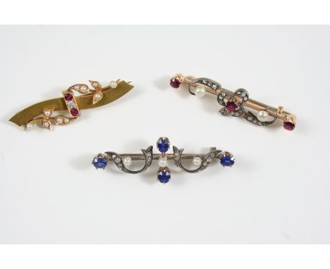 A VICTORIAN SAPPHIRE, DIAMOND AND PEARL BROOCH of scrolling form, set with oval-shaped sapphires, rose-cut diamonds and three