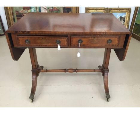 An Edwardian-style mahogany cross-banded sofa table