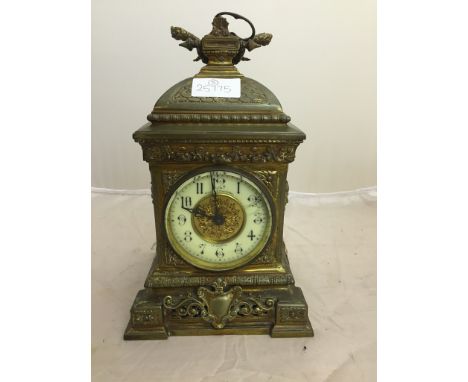 A Victorian brass mantel clock by Curtis & Horspool, Leicester