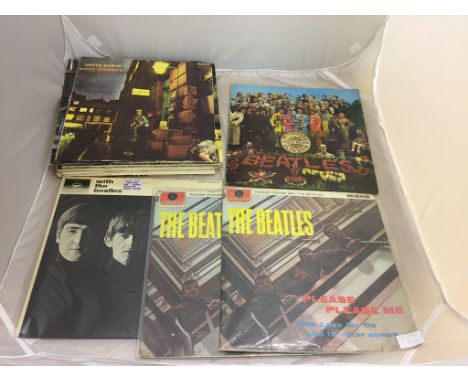 Four Beatles albums and a poster in Japanese: Sgt Pepper with original sleeve and cut-out, Rolling Stones' first album, The W