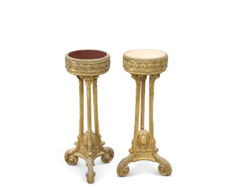 A PAIR OF 19TH CENTURY FRENCH GILTWOOD JARDINIÈRES, each circular planter supported on a tri-form stem continuing to leaf-for