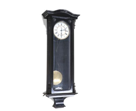TWO 19TH CENTURY GERMAN VIENNA-PATTERN WALL CLOCKS, the first ebonised, the second ebonised and walnut, each with Roman numer
