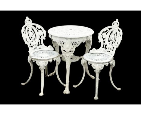 A WHITE PAINTED METAL GARDEN TABLE AND PAIR OF CHAIRS, the table with pierced top and shelf stretcher, the chairs with circul