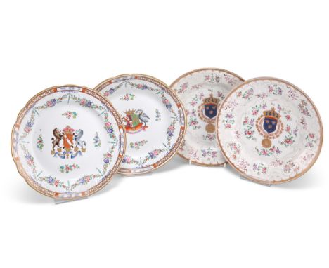 TWO PAIRS OF CHINESE ARMORIAL PLATES, each enamel painted with coat of arms and flowers. (4) Larger pair 24cm diameter