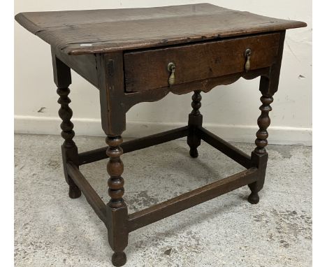 A 17th Century oak single drawer side table on bobbin turned supports, 78 cm wide x 49 cm deep x 67 cm high