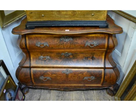 An 18th century style figured walnut and crossbanded bombe commode, 91.5cm wide. 
