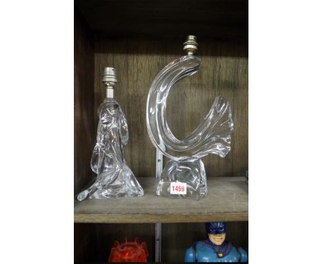 A Daum clear glass table lamp,&nbsp;height excluding fitting 29cm; together with another clear glass table lamp.&nbsp; 