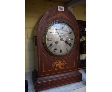 A late 19th century mahogany and inlaid lancet form mantel clock, 44cm high, with pendulum. 