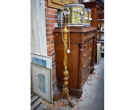 A gilt wood tripod standard lamp. 