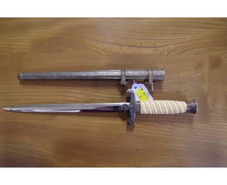 A reproduction German army officer's dagger and sheath. 