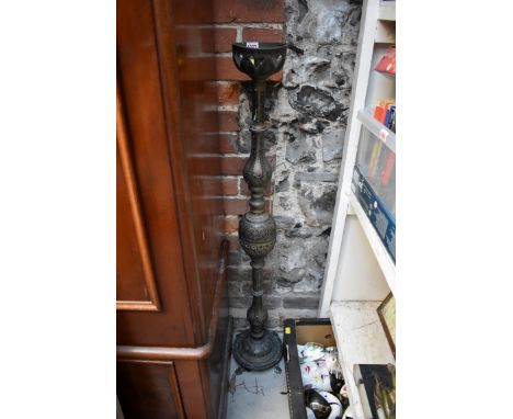 An Eastern brass standard lamp,&nbsp;111cm high.&nbsp; 