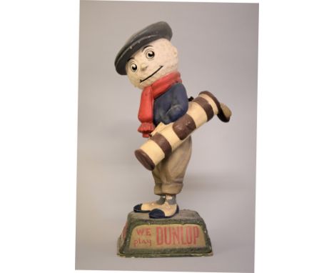 A vintage 'We Play Dunlop' advertising golf figure,&nbsp;39cm high, (s.d).