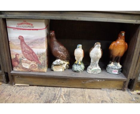 A Royal Doulton 70cl Famous Grouse whisky decanter,&nbsp;in card box; together with a Royal Doulton Kestrel spirit flask; a B