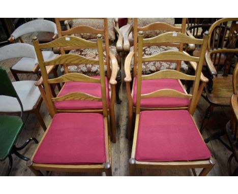 A set of four Ercol light elm ladder dining chairs,&nbsp;to include a pair of elbow chairs. 
