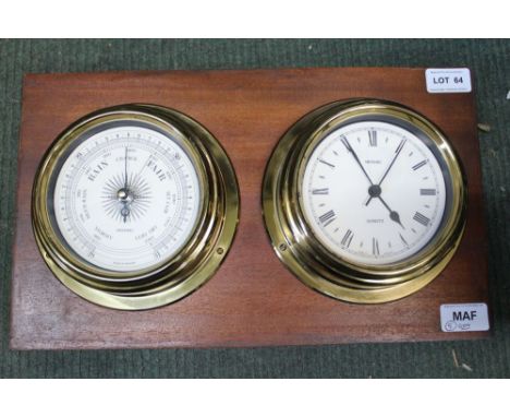A wooden backed wall mountable ships porthole barometer and timepiece 