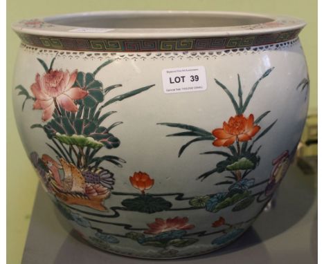 A painted Oriental ceramic fishbowl planter 