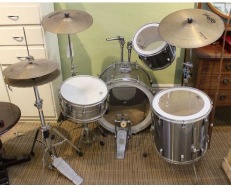 A Pearl export series brushed aluminium drum kit with a selection of 'Paiste 200' cymbals 