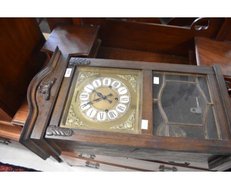 A reproduction wall clock, named President