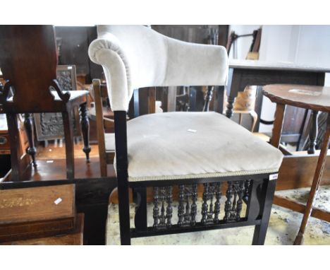 A Victorian corner chair having bobbin style frame and later dralon upholstery