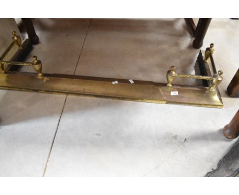 A brass adjustable fire fender