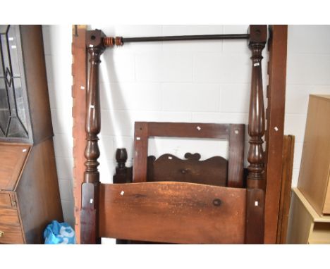 A traditional mahogany tester bed, base width approx. 138cm, looks complete but no guarantees, bolt construction&nbsp;