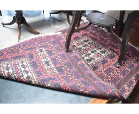 A Persian style rug, approx. 150 x 90cm