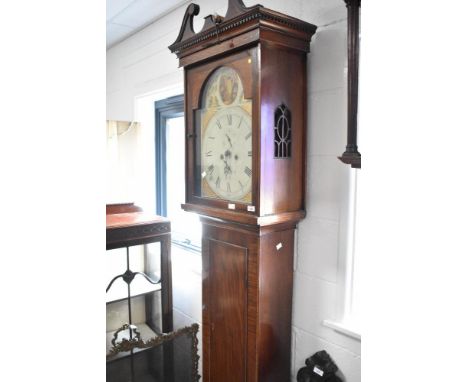 A late 19th or early 20th Century mahogany long case clock , having eight day movement, the painted arch dial having Britanni