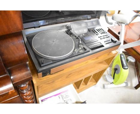 A vintage Hitachi SDT-400 music centre on laminate stand, and a pair of Toshiba surround sound speakers&nbsp;