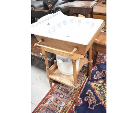 A 19th Century fresh washstand with ceramic basin and cistern, width approx 63cm , depth 50cm, height 92cm
basin sits in stan
