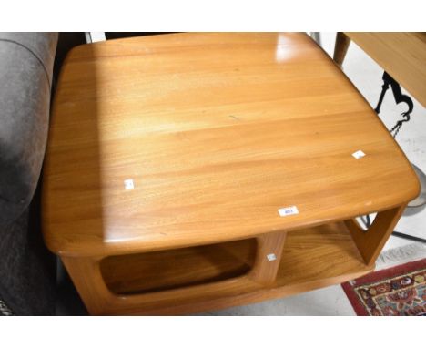 A vintage Ercol stylised coffee table in the Golden Dawn pandora style, having two drawers, approx. 80 x 80cm