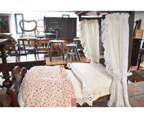 A 19th Century mahogany framed dolls or specimen half tester bed, with bedding including patchwork quilt etc, dimensions appr
