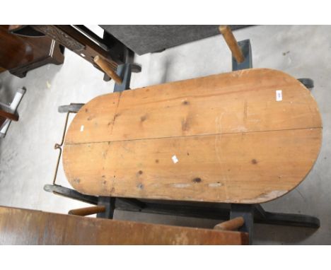 A large vintage wooden sled