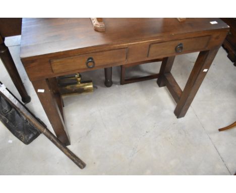 A modern hardwood console or side table, having two frieze drawers, width approx. 92cm